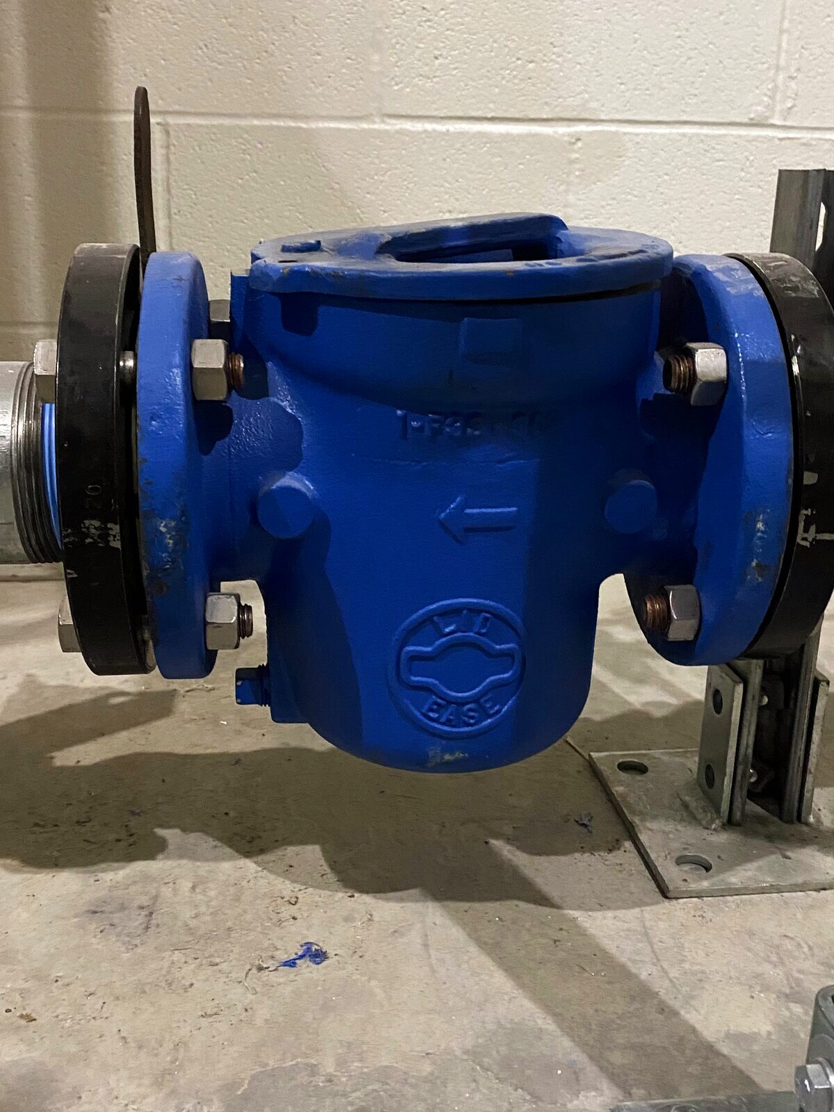 Flanged check valve installed on a pump system