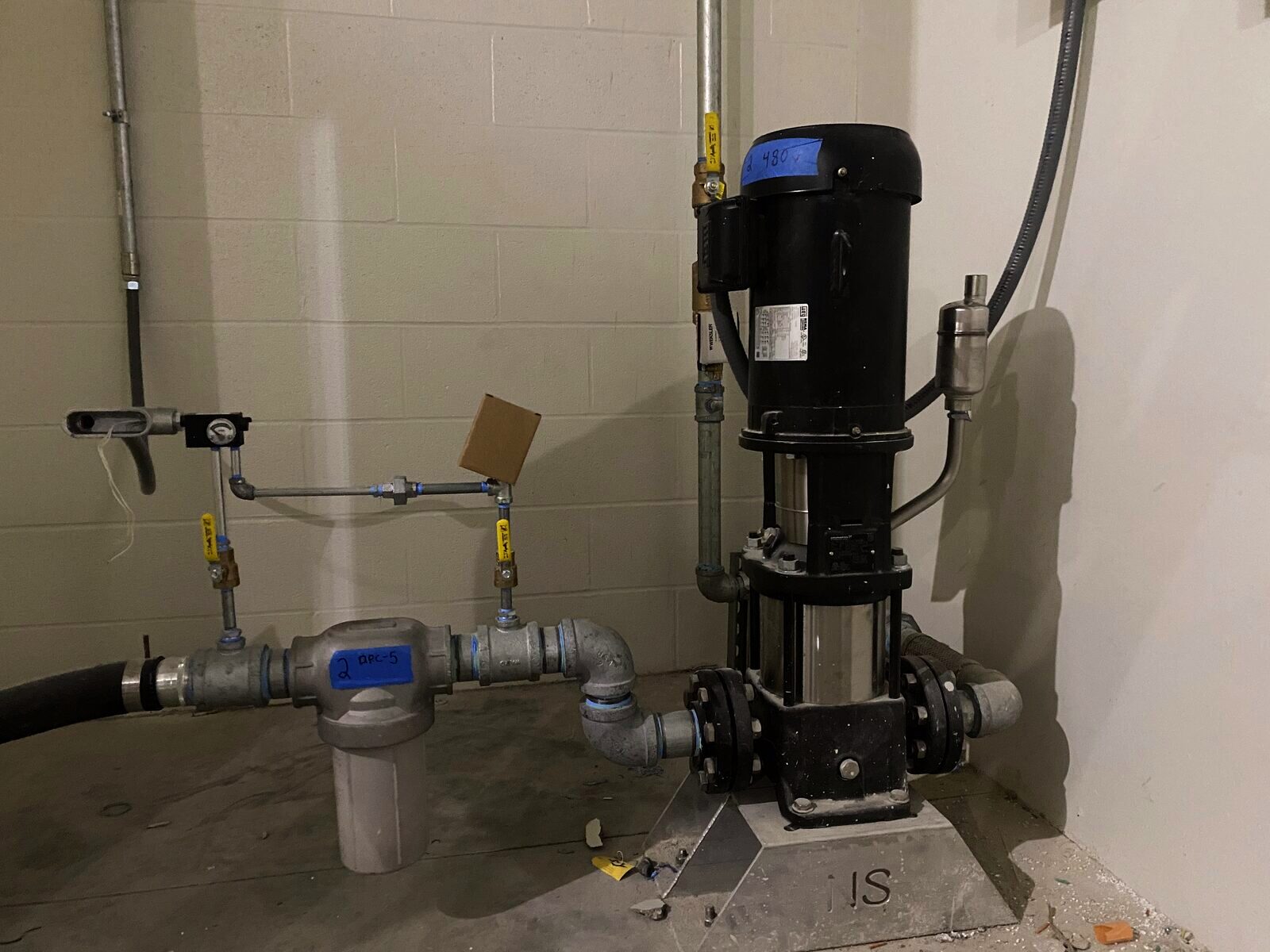 Vertical multistage pump skid with piping and valves