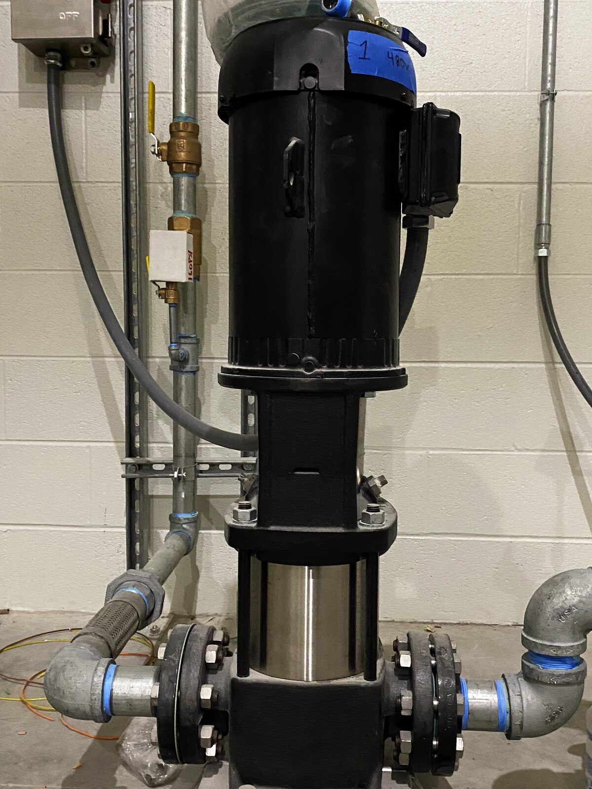 Vertical multistage pump installed with piping and isolation valves
