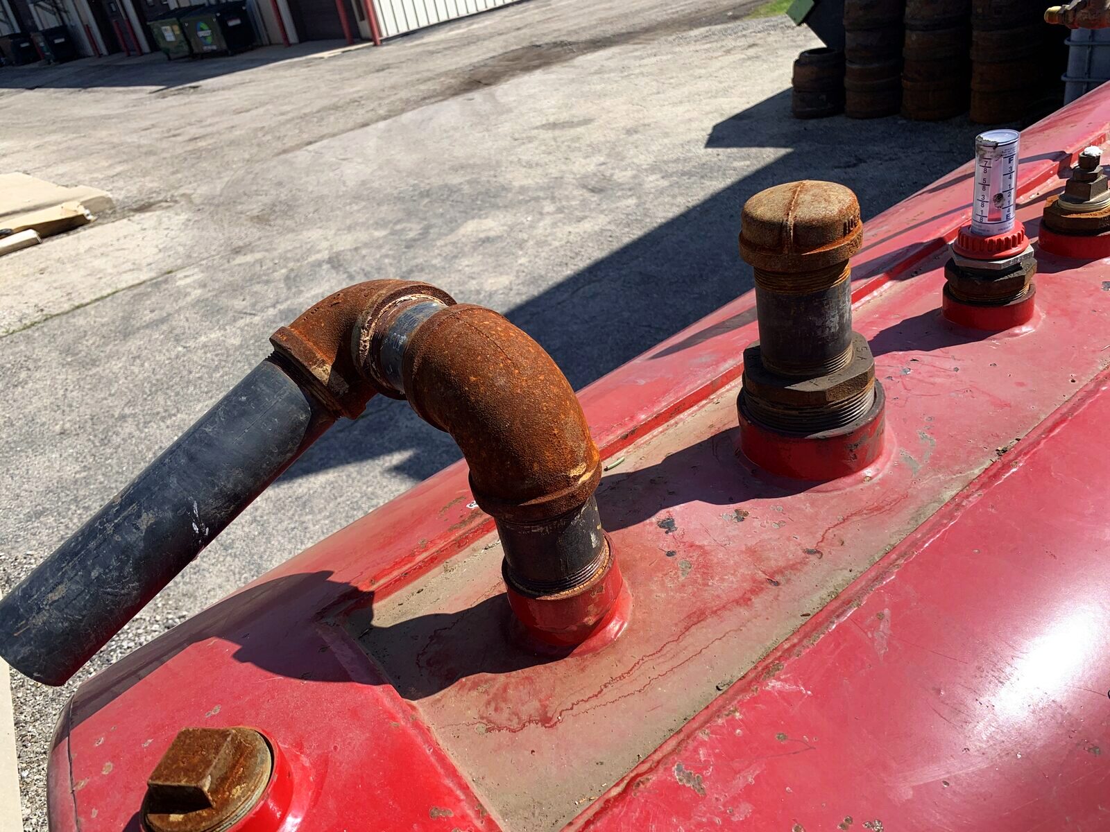 Custom tank-top fittings, vents, and fill connections