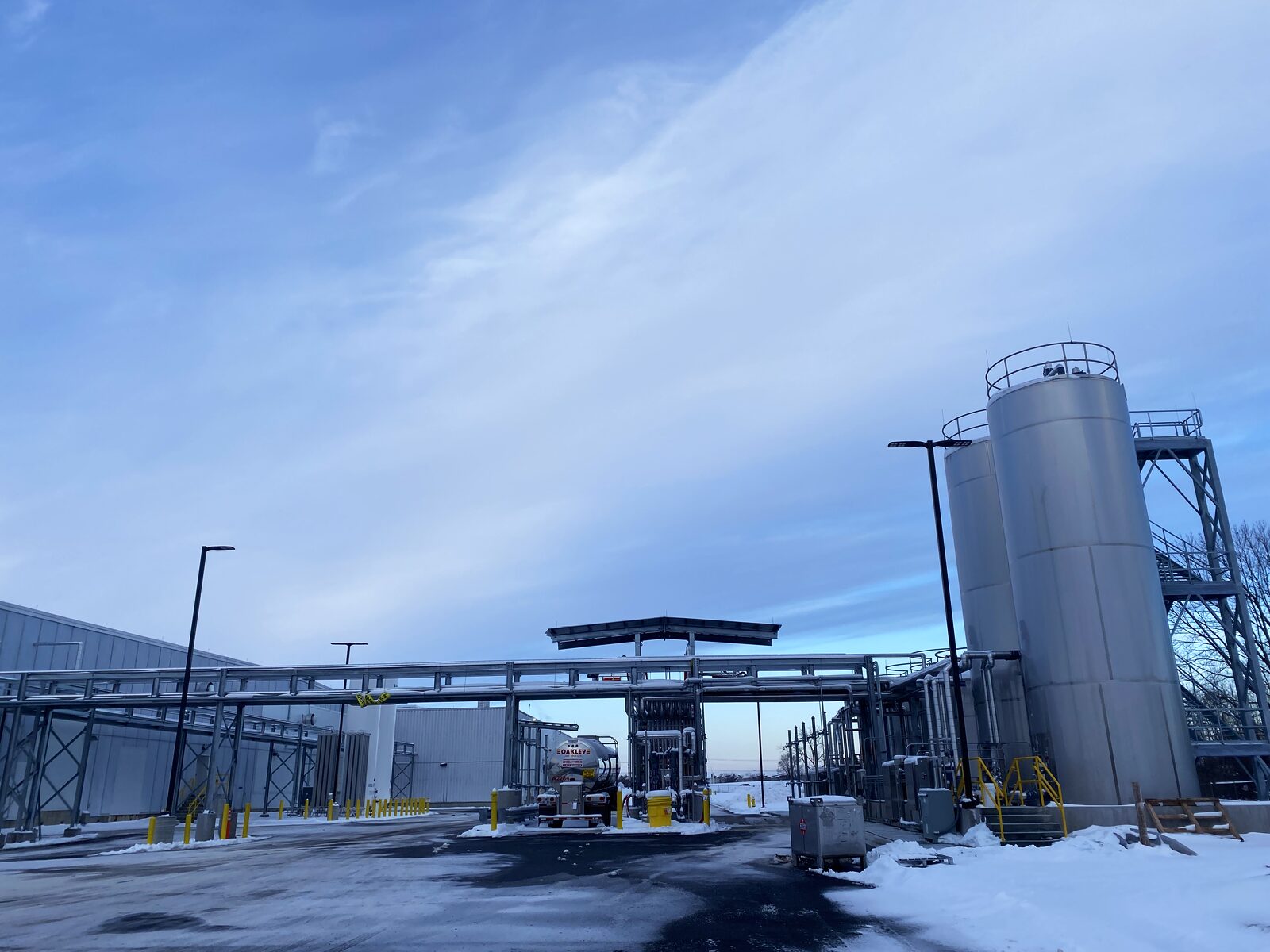 Truck loadout canopy and storage silo at an operating terminal