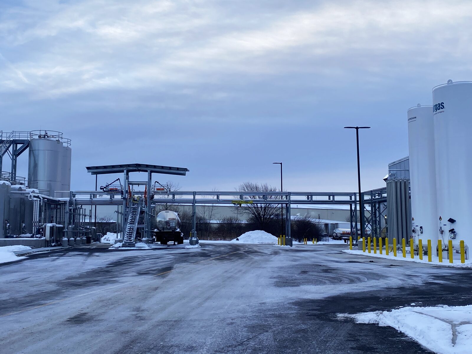 Terminal yard with silos and loading infrastructure in winter