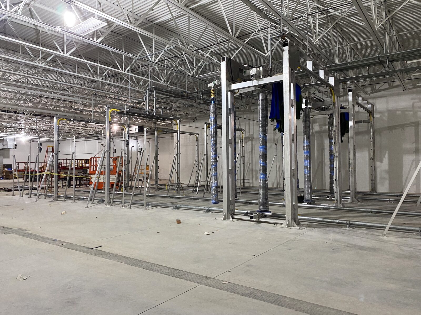 Rows of wash gantry structures erected in the new wash building